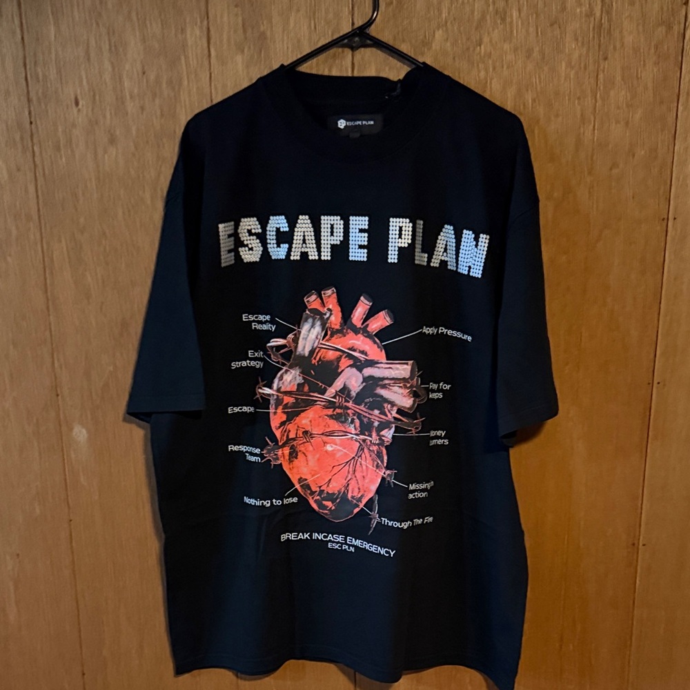Escape Plan emergency tee Black Graphic Tee with Red Anatomical Heart